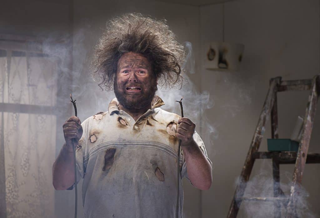 man with crazy hair from electrical explosion
